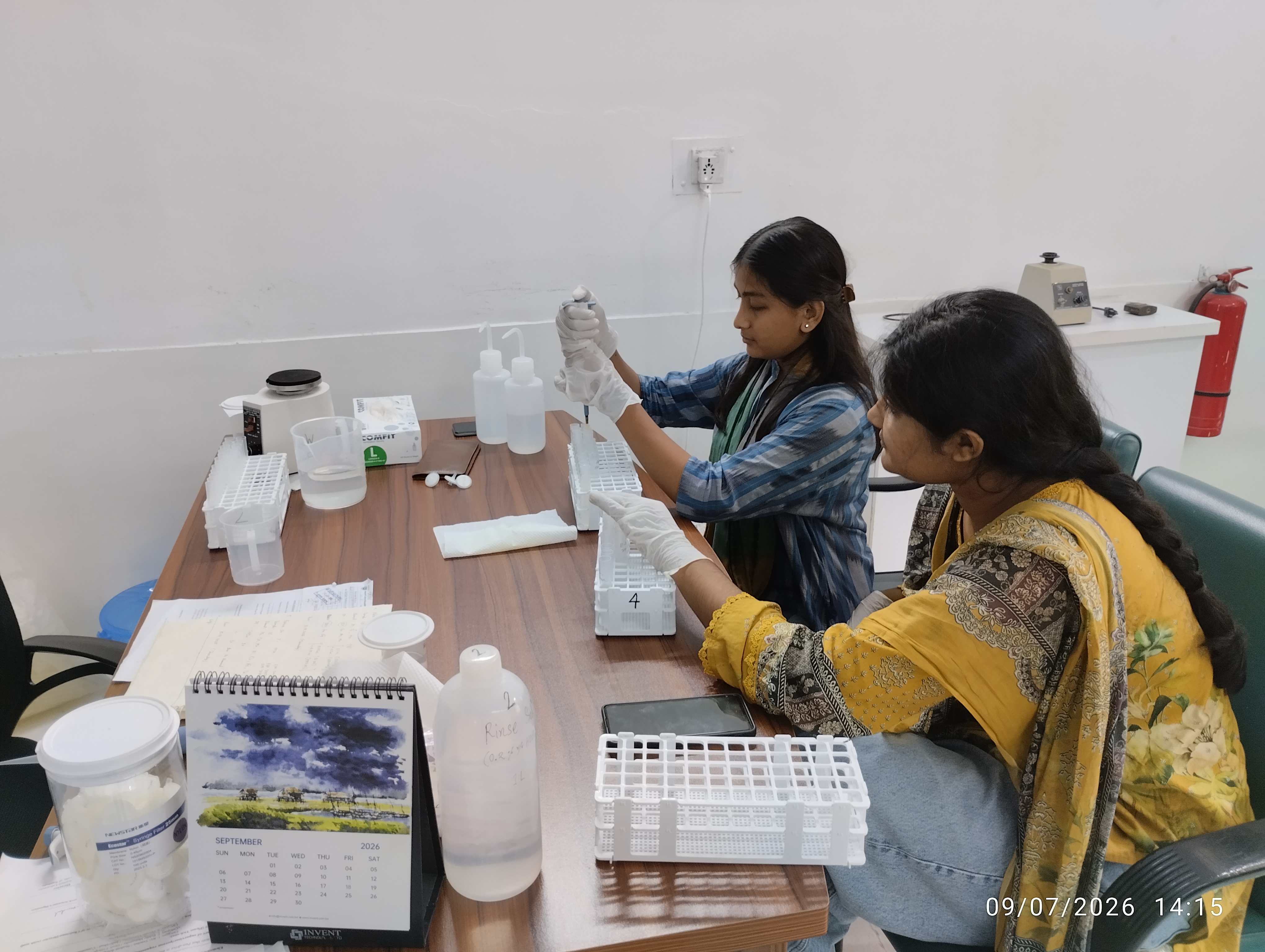 Students from the Dept. of Geology & Mining, RU are preparing samples for ICP-OES