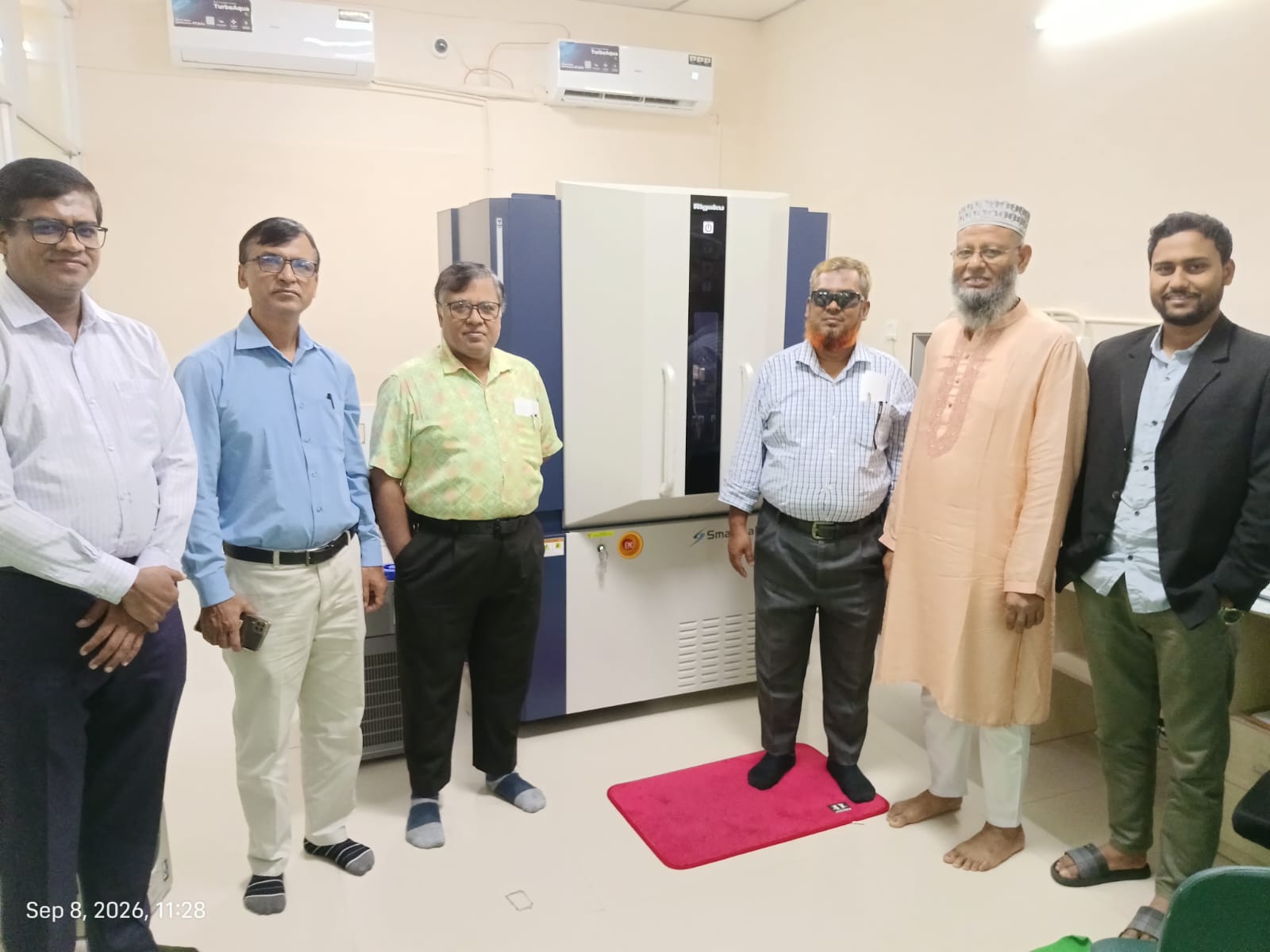 Teachers from JnU along with the director and the engineers of CSLab with the XRD